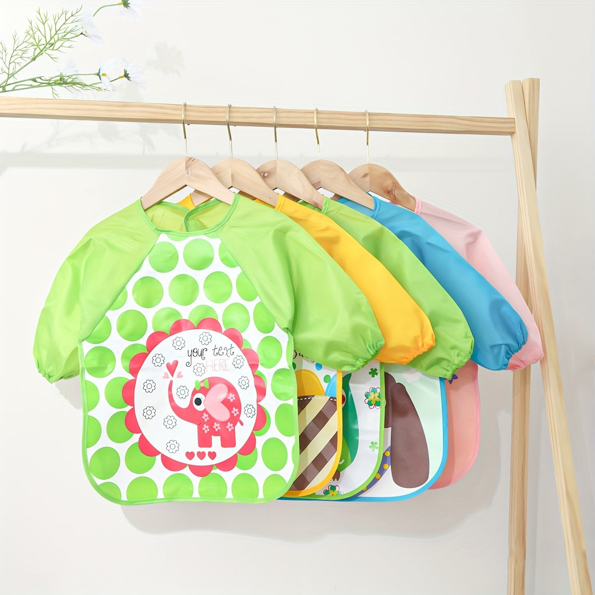 Delantal reversible de manga larga resistente al agua con estampado de dibujos animados para comer sin ensuciarse