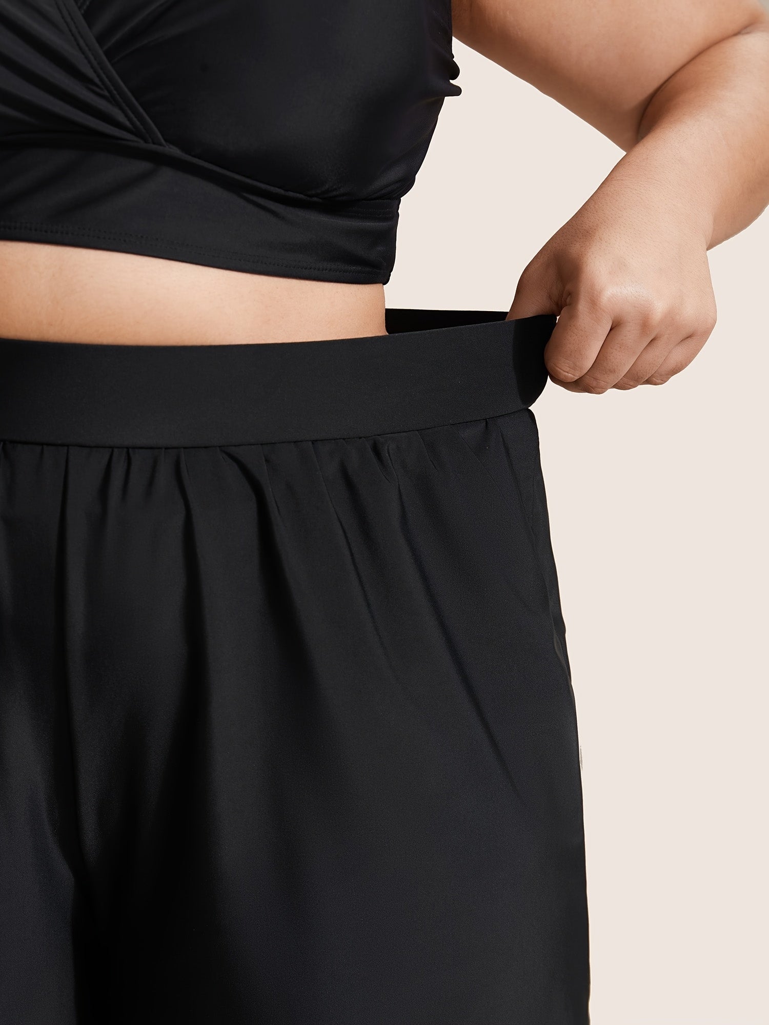 Ayollar uchun bir rangli yuqori belli pleated shortlar, nafas oladigan yozgi model