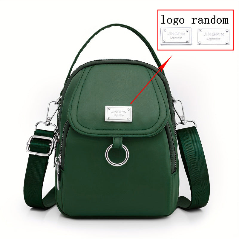 Ayollar uchun nylon crossbody sumka, katta sig'imli, bir rangli, zip yopilishi, polyester astarli, kundalik foydalanish va maxsus tadbirlar uchun ko'p funksiyali, qizil yoki qora ranglarda mavjud.