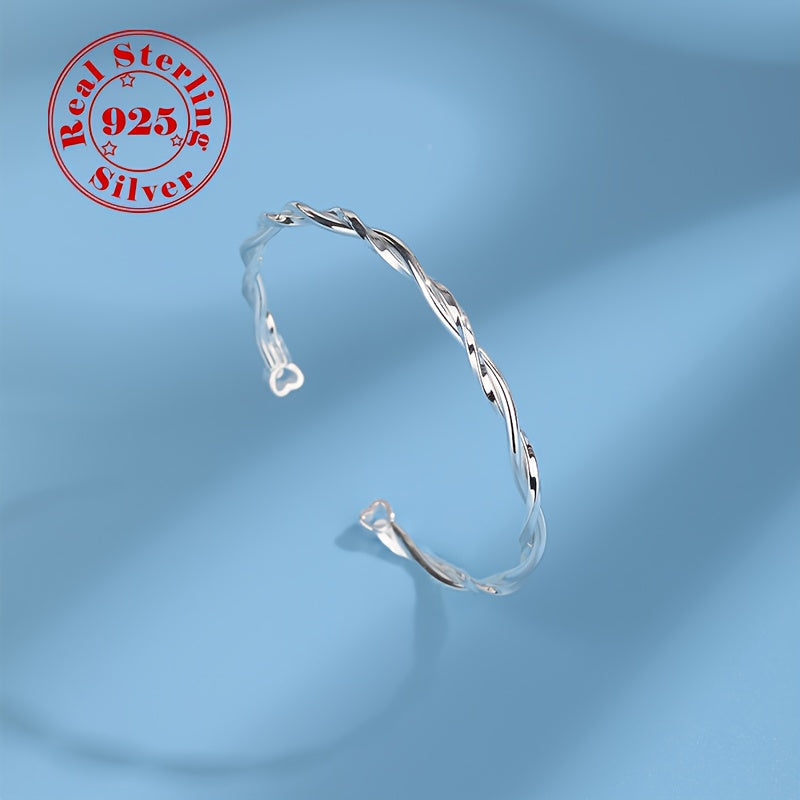 Women's Silver Twisted Möbius Band Bracelet with White Gold Plating and Zirconia
