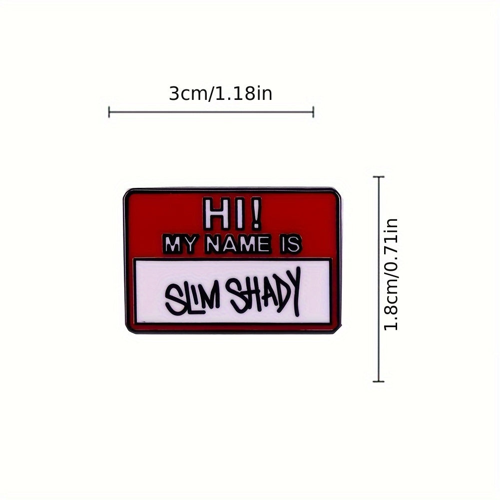 Mening sirli va qiziqarli ismim bor. Men inglizcha yozuvli metall broshka yelkamda faxr bilan taqaman. Bu, musiqani, modani va uslubni ifodalovchi, reper Amu ning "Broshka" qo'shig'ida ko'rsatilgan broshka.