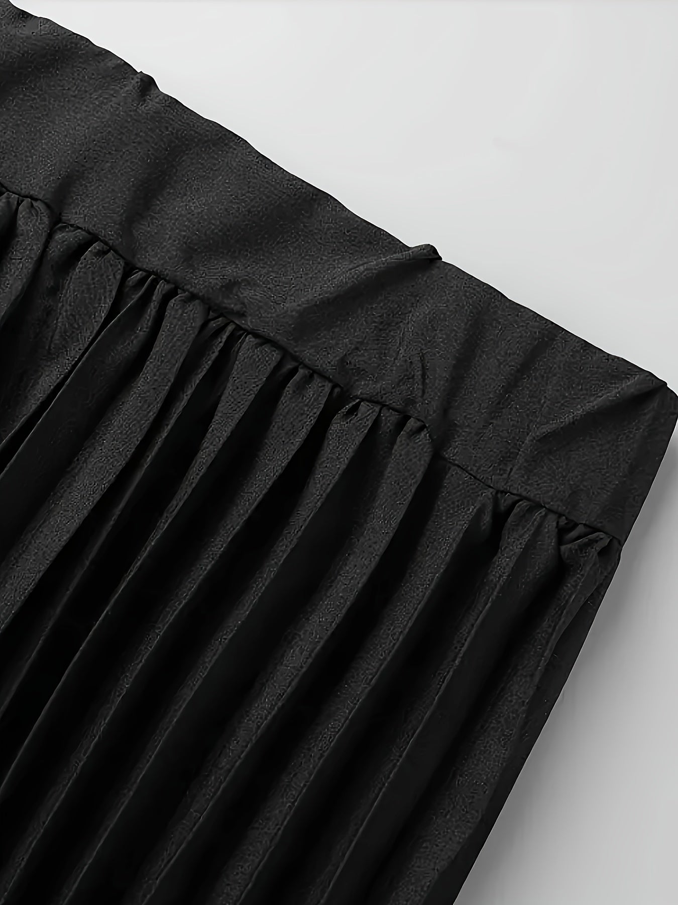 Katta o'lchamdagi ayollar uchun bir rangli, nafis elastik bel maxi yubka.