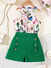 Yozgi faoliyatlar yoki sovg'alar uchun yurak, gullar va kapalak grafikalariga ega bo'lgan halter tepa va tugmachali shortlardan iborat 2-qismli to'plam.