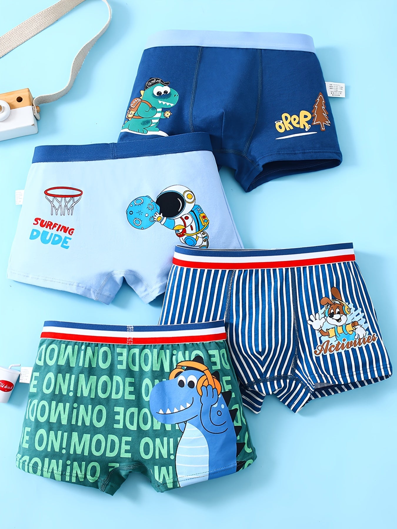 Conjunto de 4 calzoncillos bóxer de algodón para niños con estampados de astronauta y dinosaurio, transpirables, elásticos y aptos para todas las estaciones