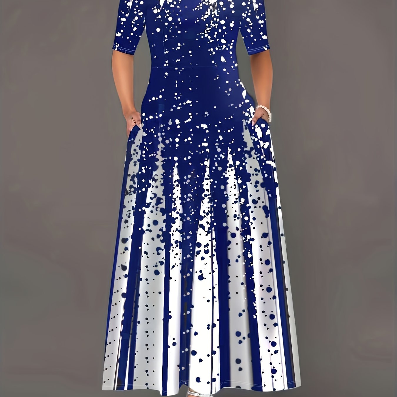 Классическое макси-платье в черно-белый горошек для женщин, с круглым вырезом, длинными рукавами и силуэтом А-силуэта. Изготовлено из эластичного полиэстерового смеси и подходит для машинной стирки.