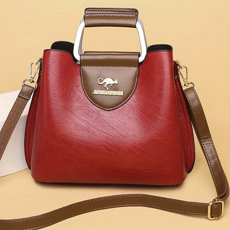 Chic vintage uslubidagi ayollar uchun yelka sumkasi, sozlanadigan kamar, mustahkam PU charm, polyester astar, zip yopilishi. Qisqa sayohatlar va sovg'a berish uchun mukammal, faqat quruq tozalash.