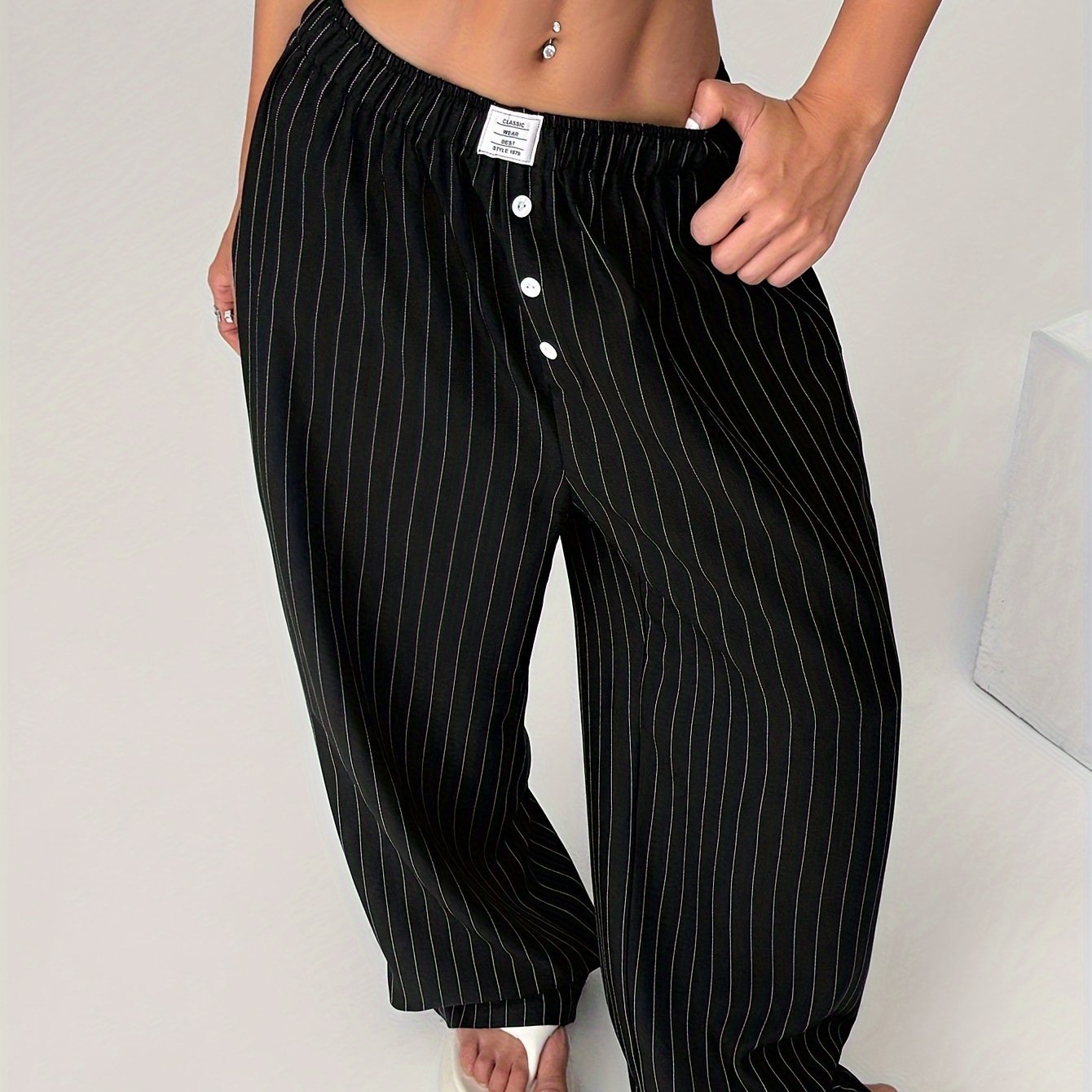 Pantalones de mujer de talla grande con rayas anchas, botones y cintura elástica