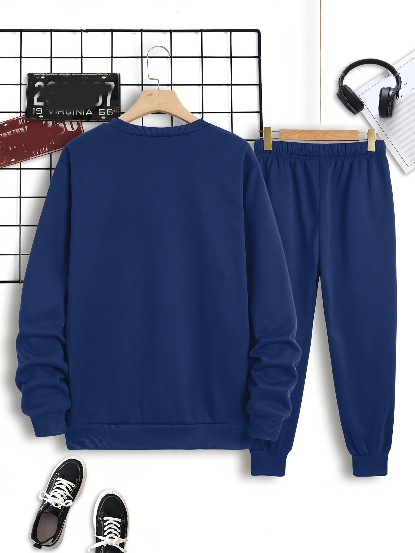 Conjunto de pijama casual para hombre con camiseta de cuello redondo de manga larga y pantalones de poliéster de punto para el otoño