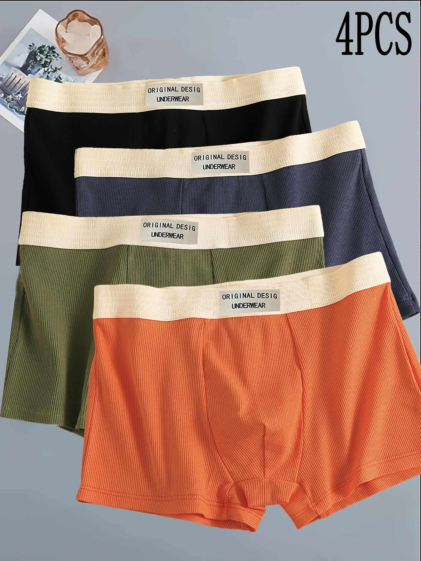 4-Pack Erkaklar uchun Boxer Briefs, 95% Polyester va 5% Spandexdan tayyorlangan, o'rtacha cho'ziluvchan trikotaj mato, bir rangli qisqa ichki kiyim, tasodifiy sport trunks, engil va qulay moslik.