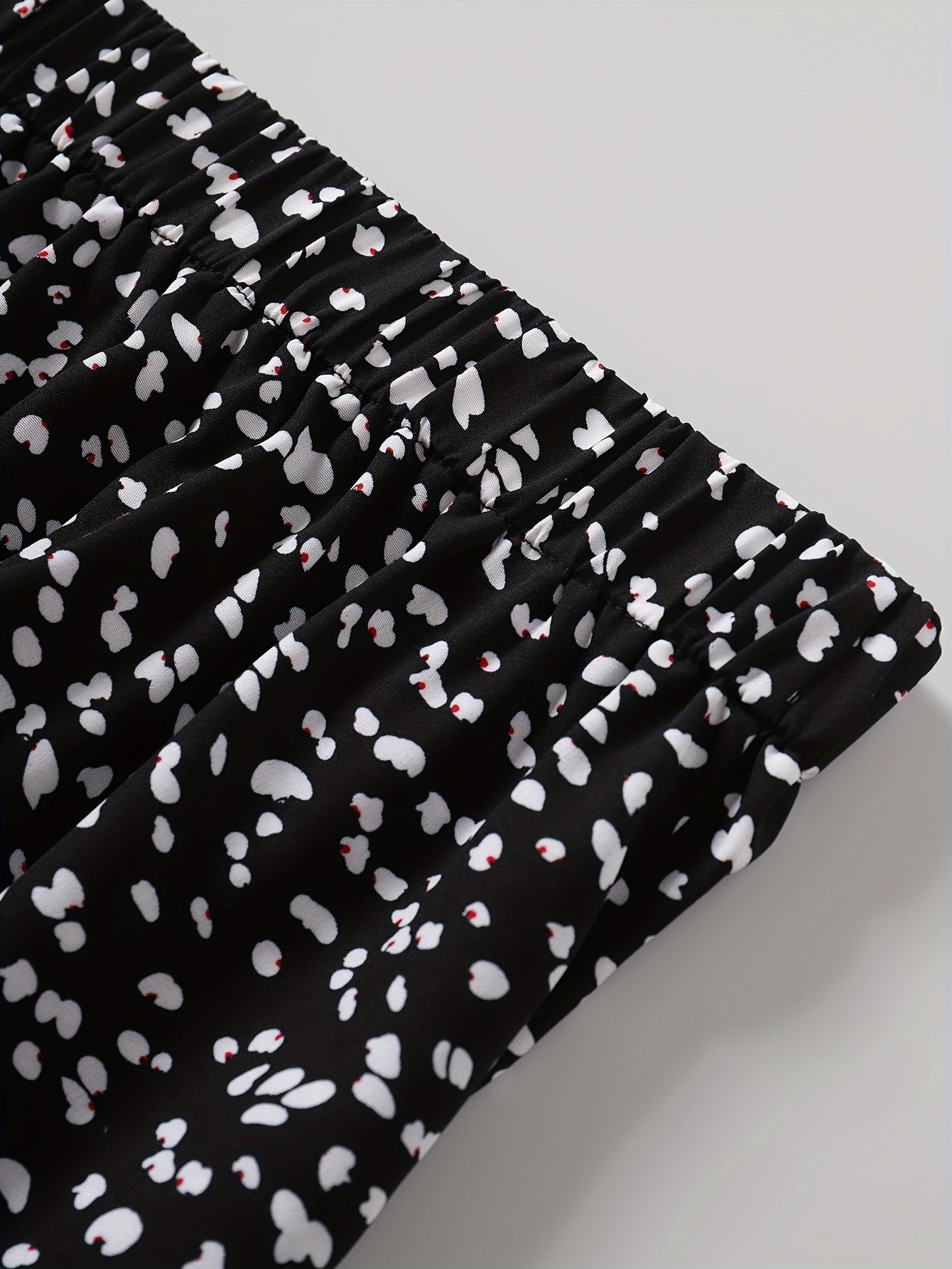 Ayollar uchun zamonaviy ikki qismli kiyim: uzun qo'l bodysuit va polyester aralashmasidan tayyorlangan gullar bilan bezatilgan yubka, kvadrat bo'yin, mashinada yuvish mumkin - bahor/yaz uchun ideal.