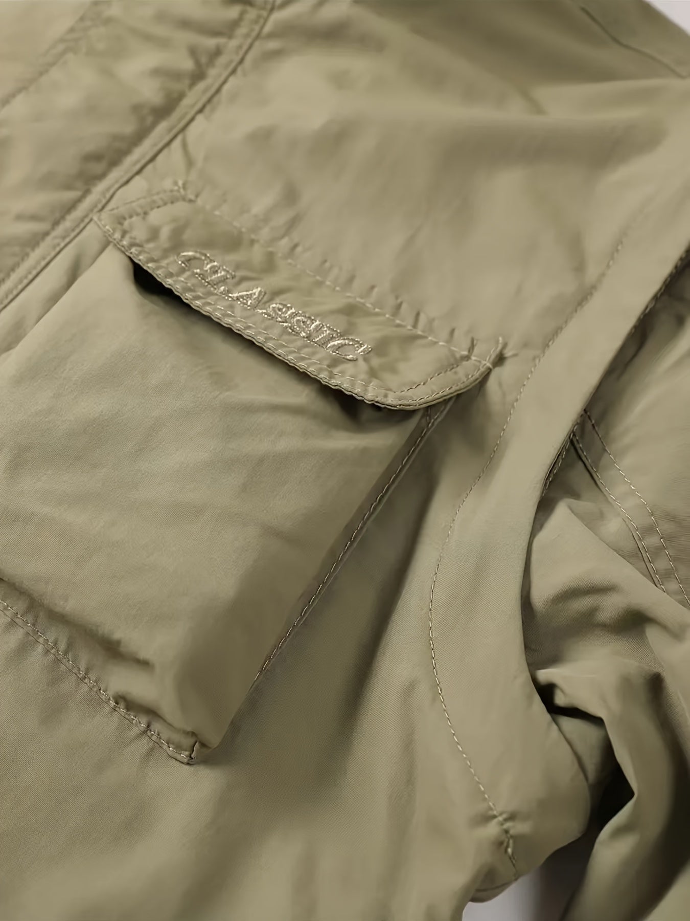 Men's Eco-Friendly Windbreaker Jacket with Detachable Hood and Multiple Pockets for Outdoor Activities