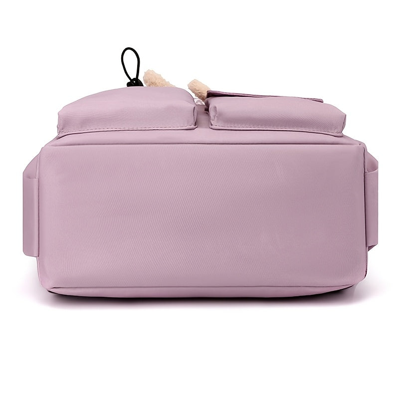 Tassel bezakli tasodifiy nylon ayollar ruksak, yengil to'quv bir rangli maktab sumkasi, sozlanadigan kamarlar, zipper yopilishi, polyester astar - yuvish shart emas.