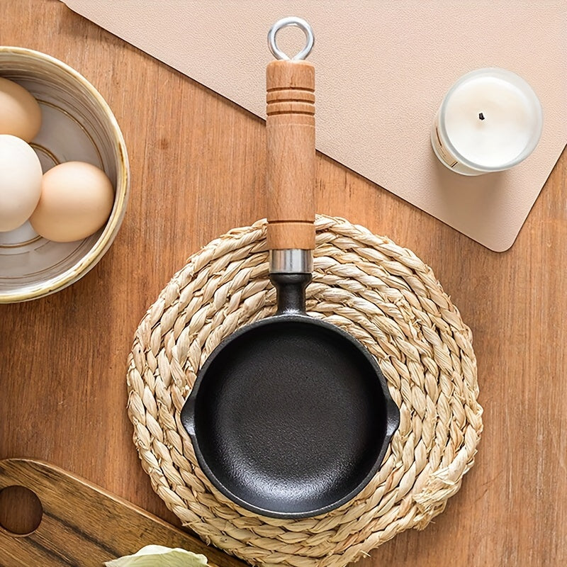 Qovurilgan tuxum dumplari mini qozonchada, qizdirilgan yog' bilan