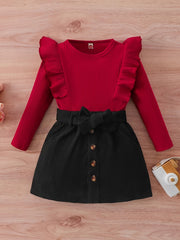 Yevropa va Amerika uslubidagi qizlar uchun kuz va qish kiyimi, ikki qismli to'plamda uchuvchi yengli bolalar bluzkasi va zamonaviy korduroy yubkasi mavjud.