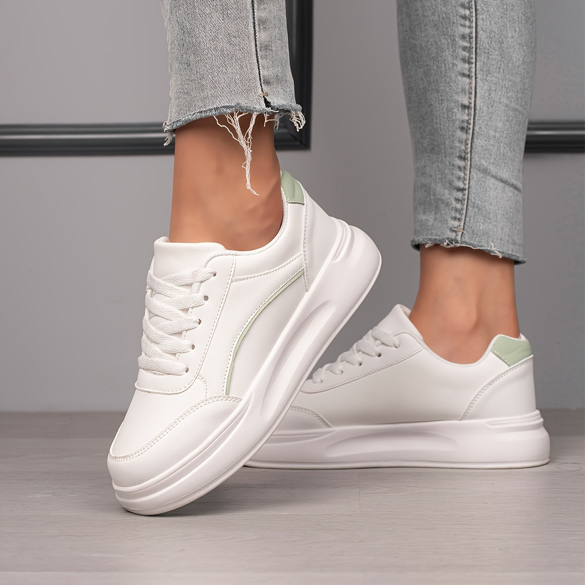 Women's White Low Top Skate Shoes with Round Toe and Lace-Up Closure