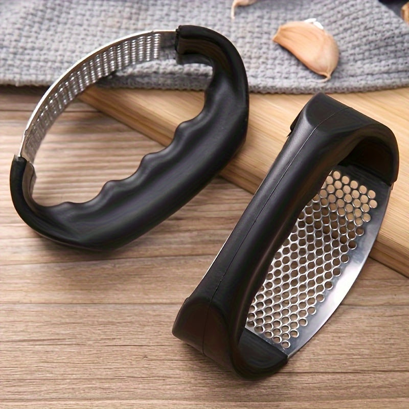 Manual Stainless Steel Garlic Press with Ergonomic Black Handle