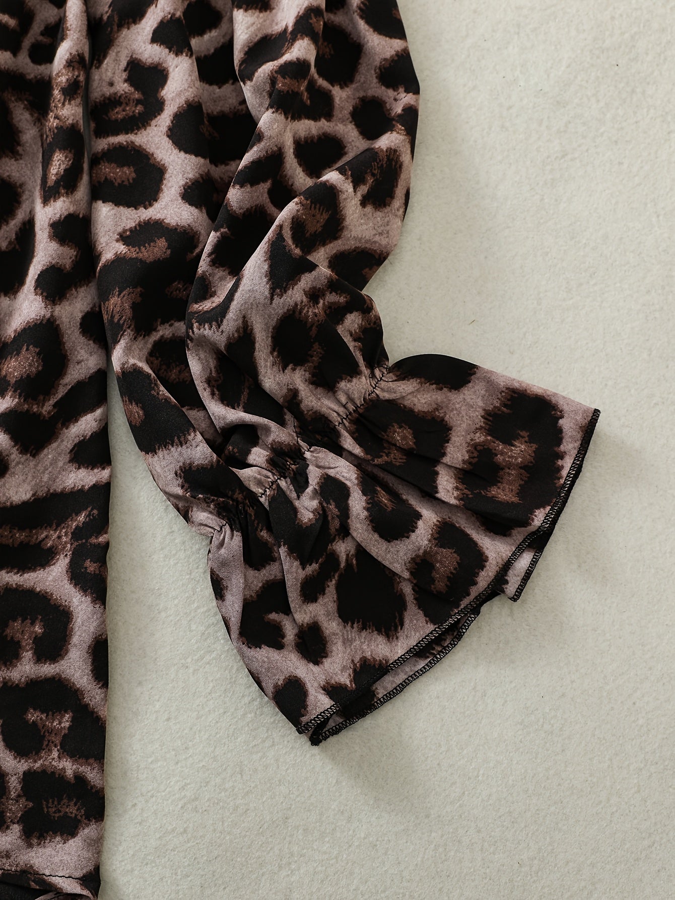 Leopard Print Off-Shoulder Blouse for Women with Asymmetrical Hem and Long Sleeves