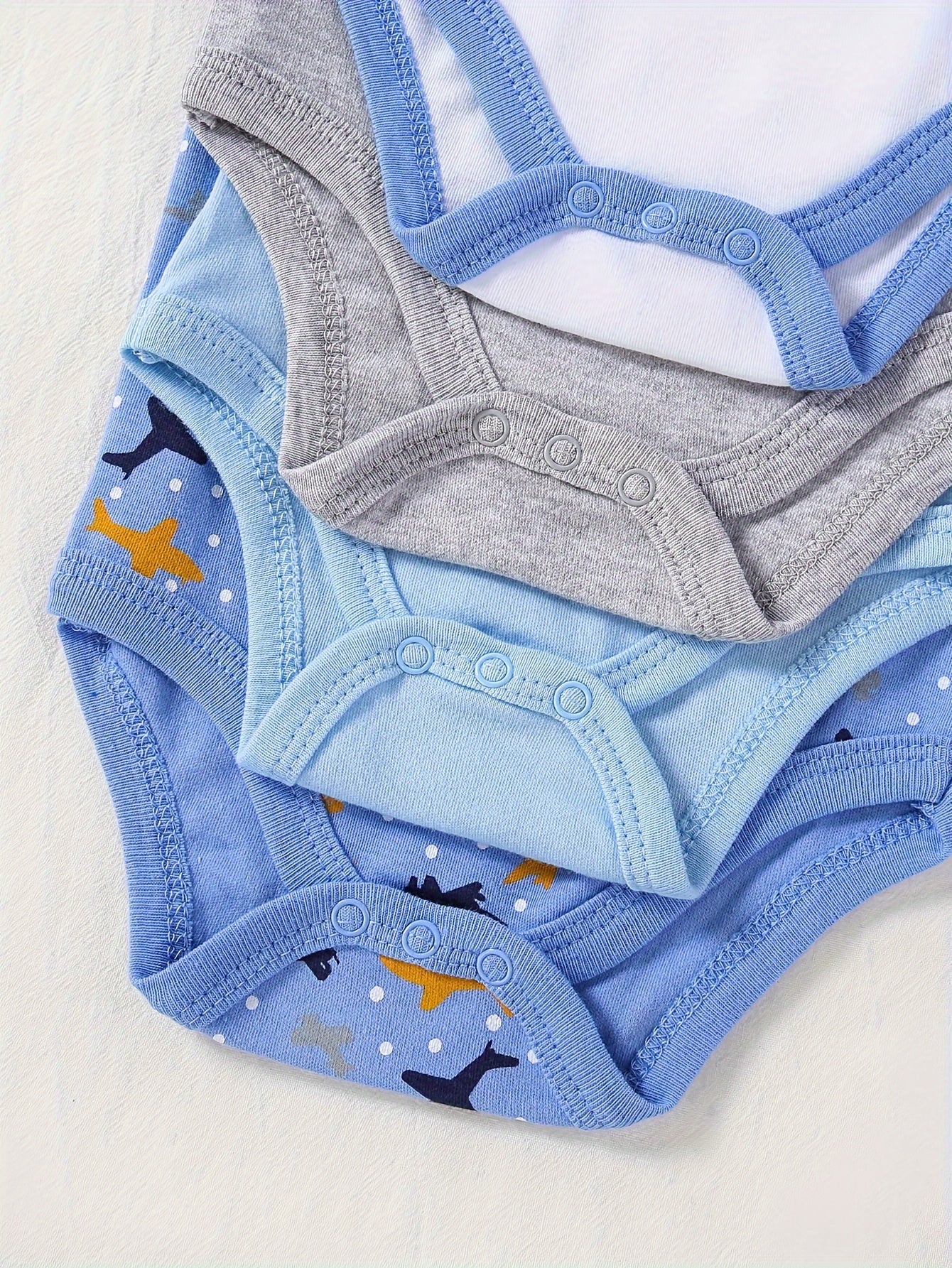 Boys 4-Pack Long Sleeve Cotton Onesies with Astronaut and Space Patterns for Fall Winter