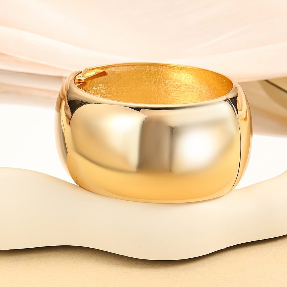 Zarif va silliq zanglamas po'latdan yasalgan baraban bilaguzuk, keng va qalin bangle dizayniga ega. Ushbu ko'p funksiyali moda aksessuari kundalik kiyish yoki sovg'a berish uchun juda mos keladi.