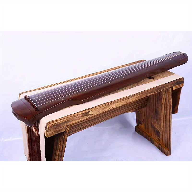 Guqin tradicional chino hecho de madera sólida de paulownia con acabado negro y clavijas de afinación doradas para principiantes