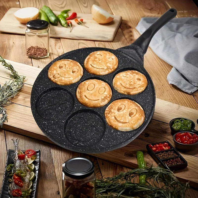 7 yuzli shakllar bilan non-stick pancake qovurdagi, issiqlikka chidamli tutqichlar bilan 7 stakanli blini tayyorlagich va qulay tozalash uchun nonushta plitasidan iborat, mehmondorchilik va bayram pancake uchun.