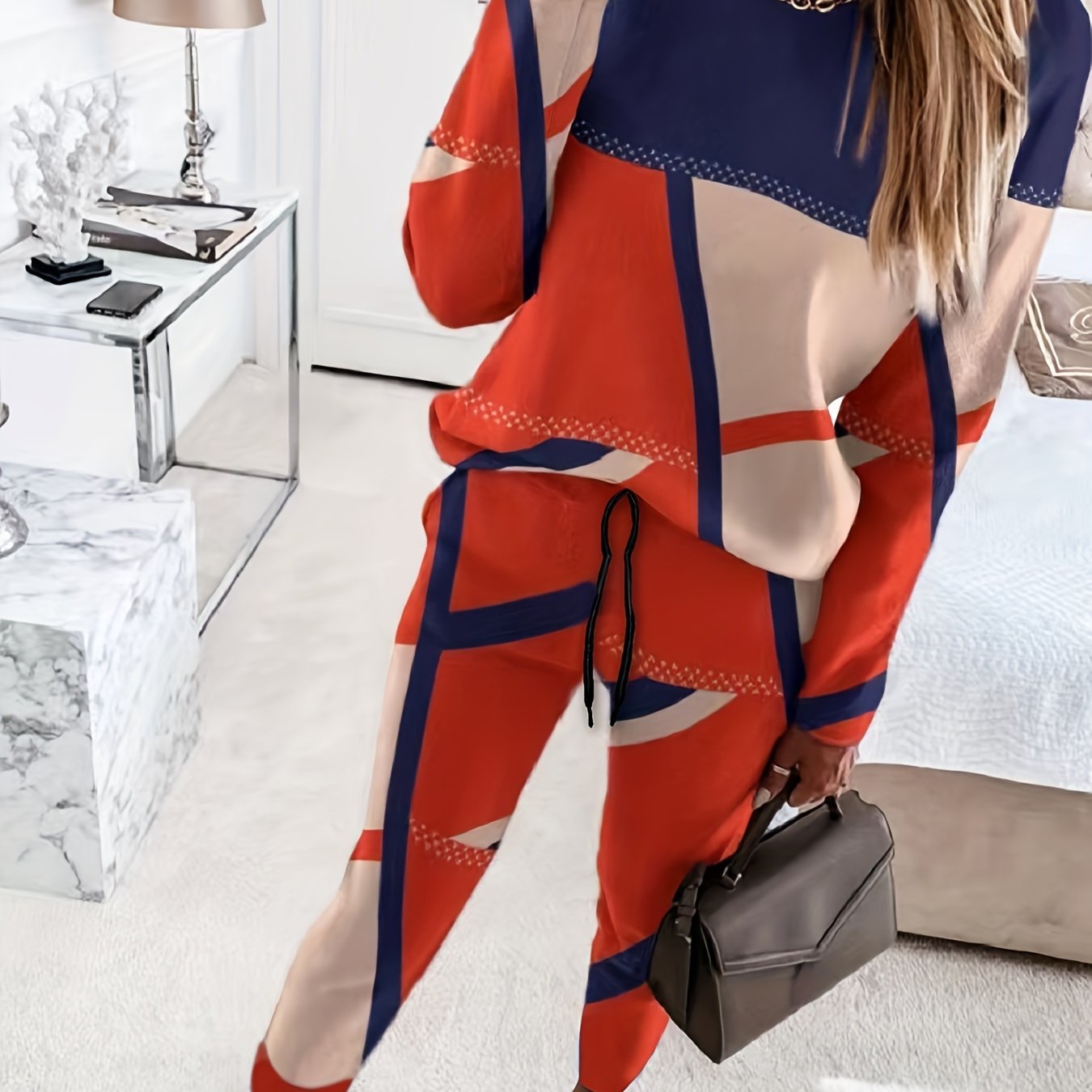 Conjunto de dos piezas con estampado geométrico de talla grande con top de cuello redondo y pantalones