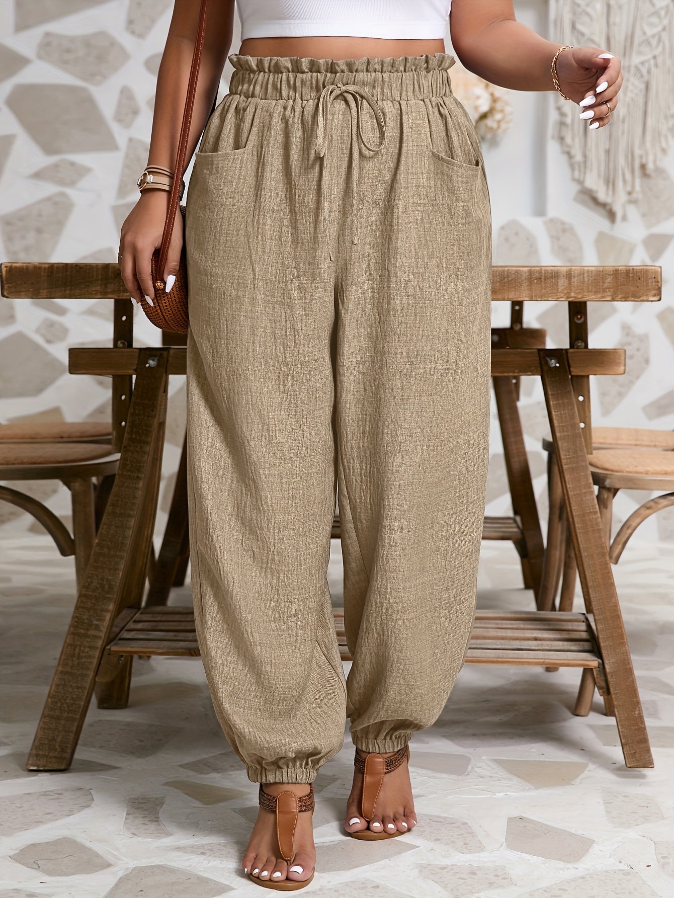 Pantalones casuales de talla grande para mujer con cintura elástica, bolsillos y color sólido