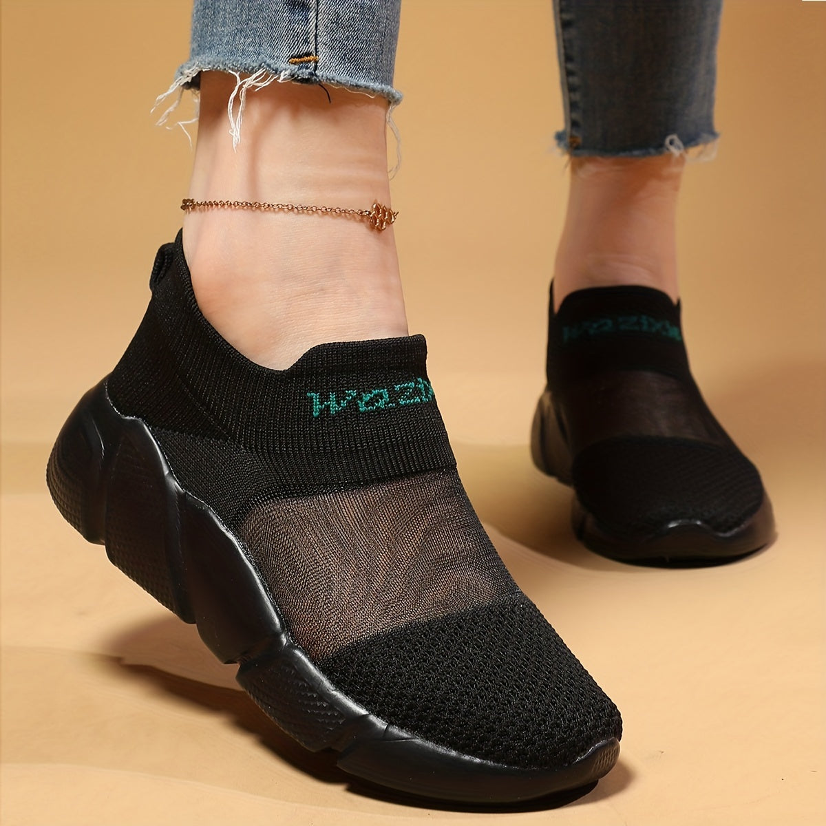 Ayollar uchun engil slip-on krossovkalar, nafas oladigan to'qima materialdan, qora rangda rangli aksentlar bilan, pastki dizayn, dumaloq barmoq, MD taglik, ochiq havoda faoliyatlar uchun ideal.