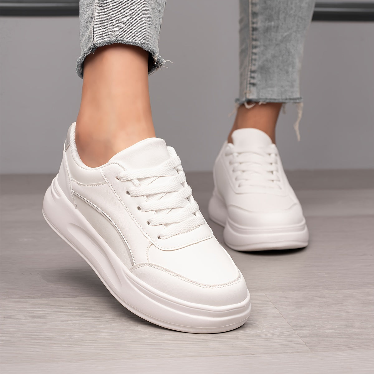 Women's White Low Top Skate Shoes with Round Toe and Lace-Up Closure