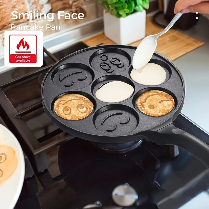 7 yuzli shakllar bilan non-stick pancake qovurdagi, issiqlikka chidamli tutqichlar bilan 7 stakanli blini tayyorlagich va qulay tozalash uchun nonushta plitasidan iborat, mehmondorchilik va bayram pancake uchun.