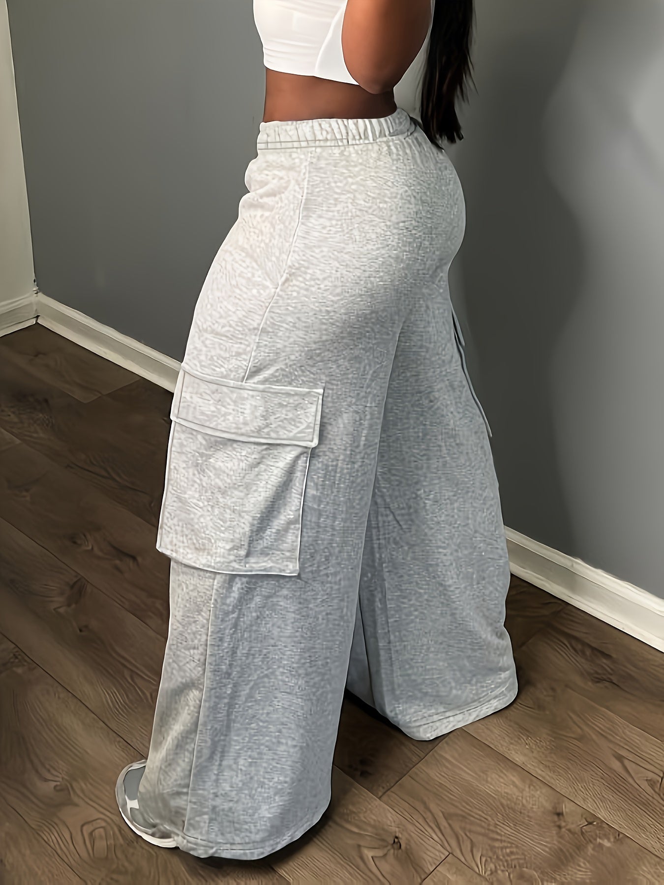 Conjunto de pantalones de trabajo para hombre de dos piezas con bolsillos laterales para herramientas gris y negro