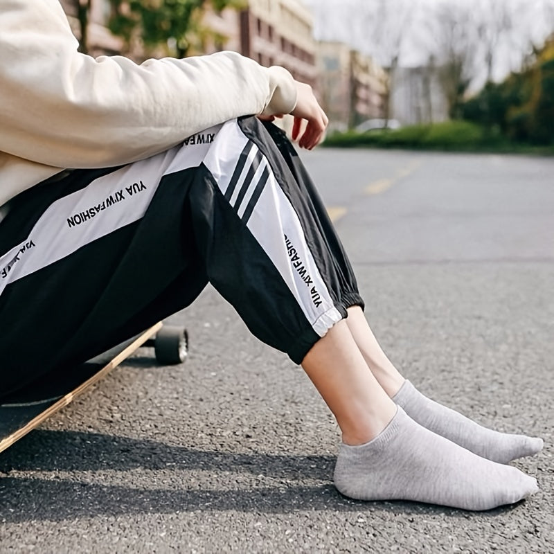 Qora va oq rangda 3 ta qulay bo'yin sochiq to'plami, sport uchun mos.