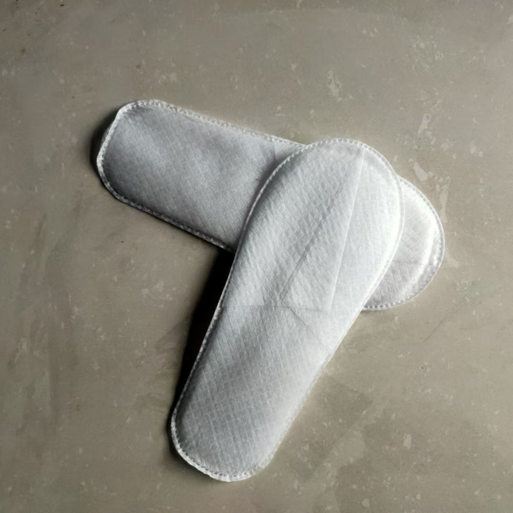 Paquete de 10 zapatillas desechables de fibra no tejida para huéspedes de hoteles y spas