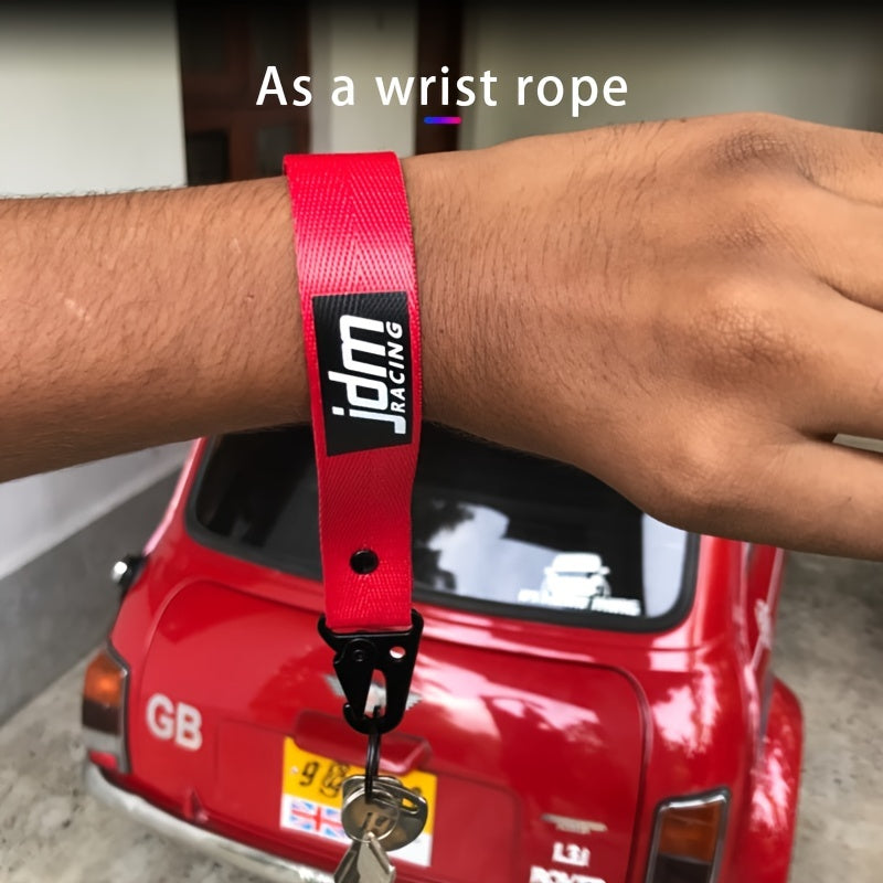 Issiq avtomobil kaliti zanjiri naylon tarmoq bilan ko‘k lentalik emblema kaliti bilan po‘lat klip bilan