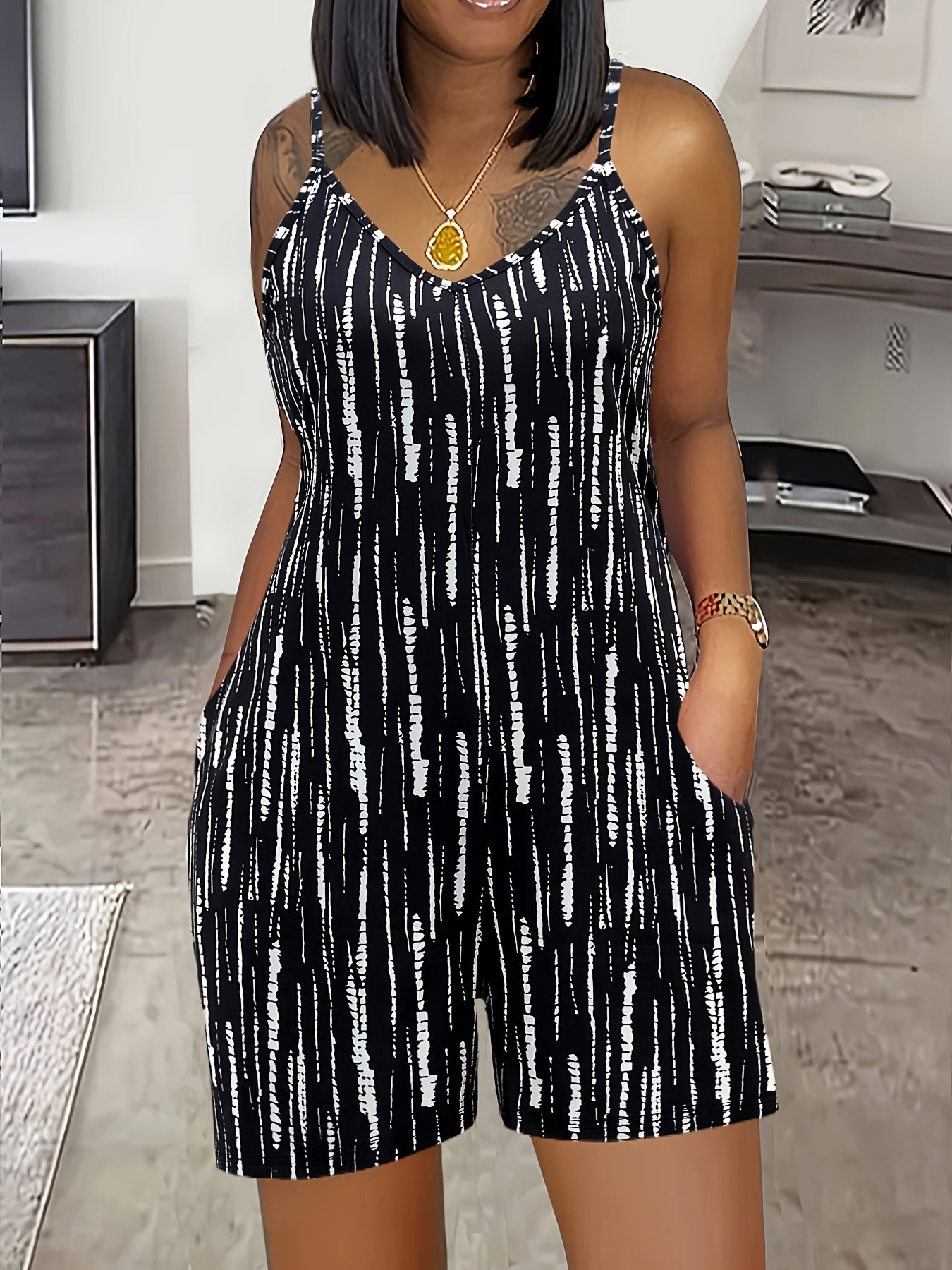 Women's Black and White Striped Sleeveless Jumpsuit with Pockets