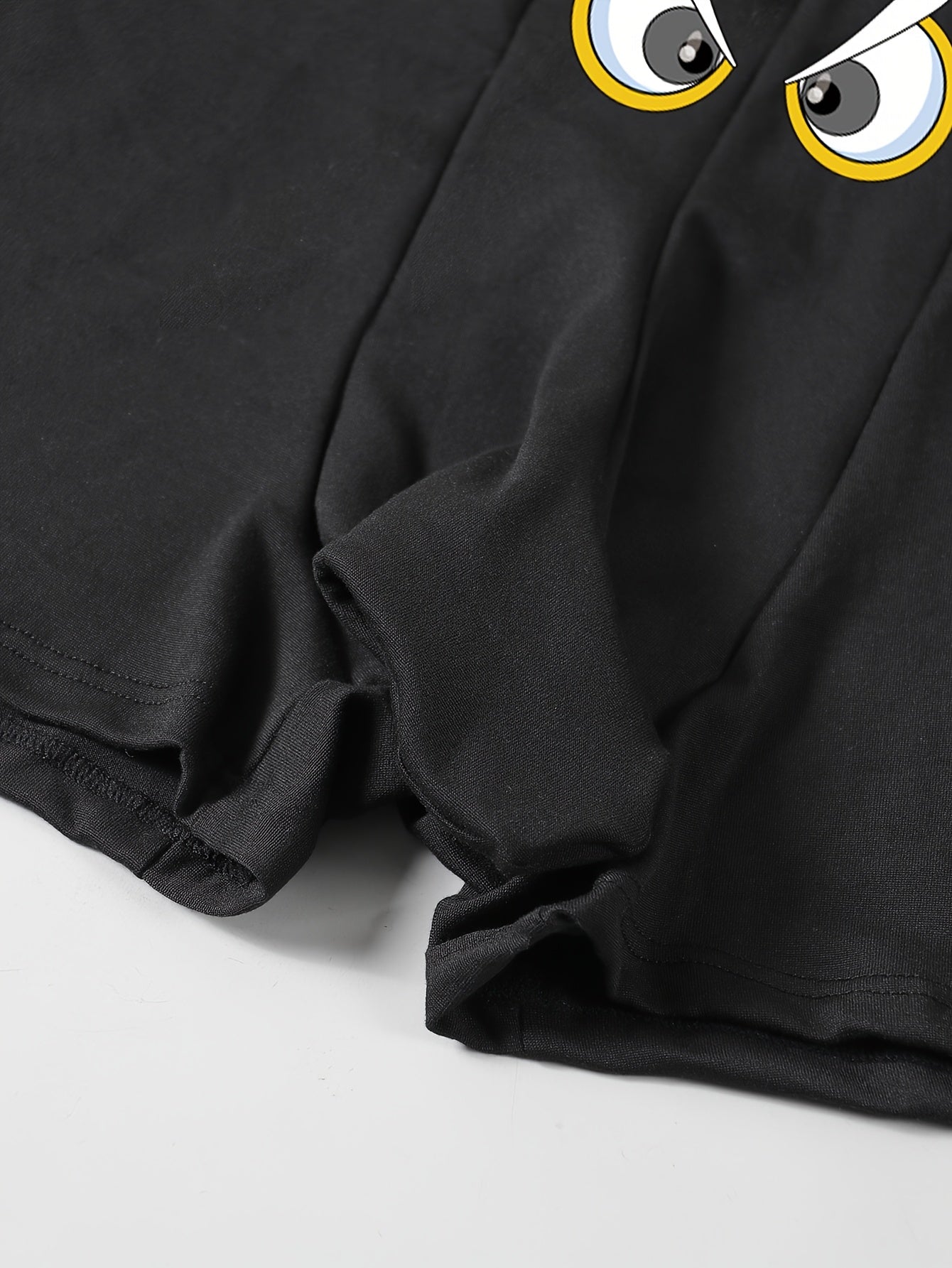 Erkaklar uchun o'yinchoq karikatura ko'z printli boxer shortlari - qora rangdagi elastik belbog' bilan cho'ziluvchan, nafas oladigan va qulay to'qilgan mato.