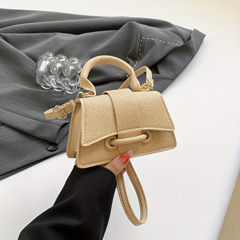 Kahaki, kulrang, pushti, yashil va och jigarrang ranglarda uslubiy mini crossbody sumka, sozlanadigan kamar, magnit yopish va astar bilan. Mustahkam rang, naqsh yoki bosma yo'q, chetlarini tugatish bilan.