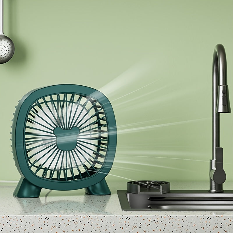 Портативный мини-вентилятор Teal с USB-питанием для охлаждения и комфорта.