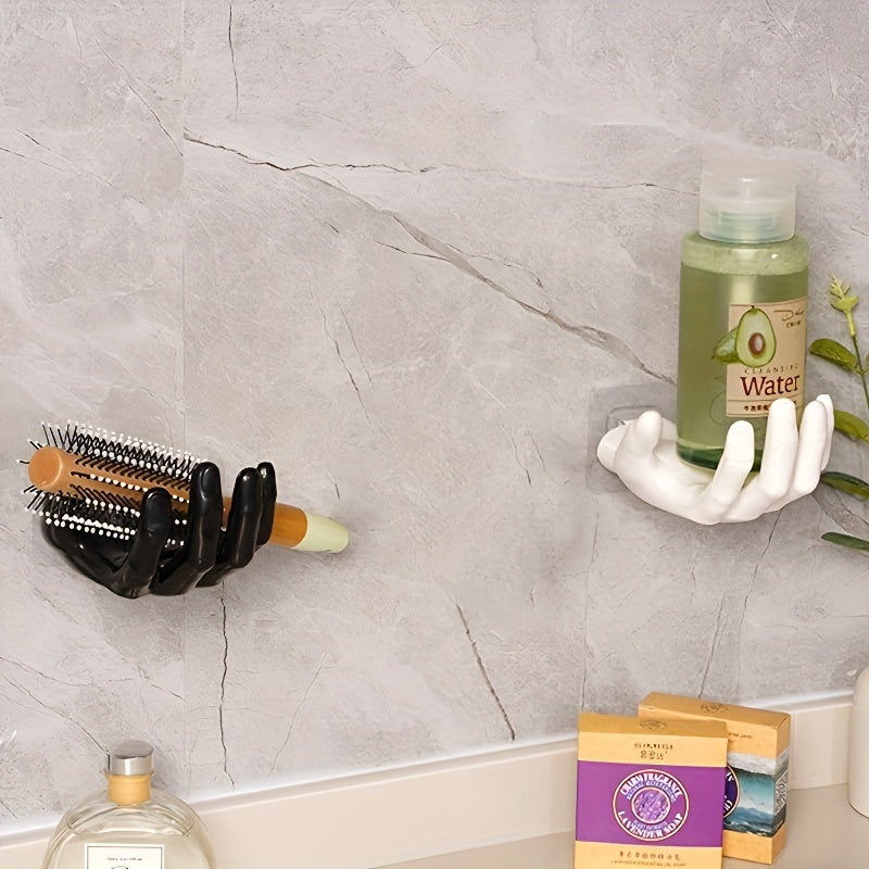 Uyda kalitlar va quloqchinlar uchun kuchli, burgusiz, iz qoldirmaydigan saqlash uchun palma shaklidagi yopishqoq devor osgichi.