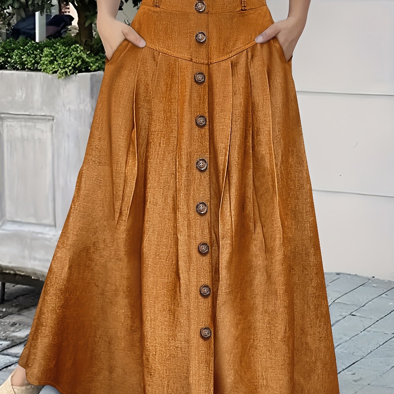 Falda de poliéster tejida de color sólido para mujer con doble bolsillo y botones en la parte delantera para primavera y verano