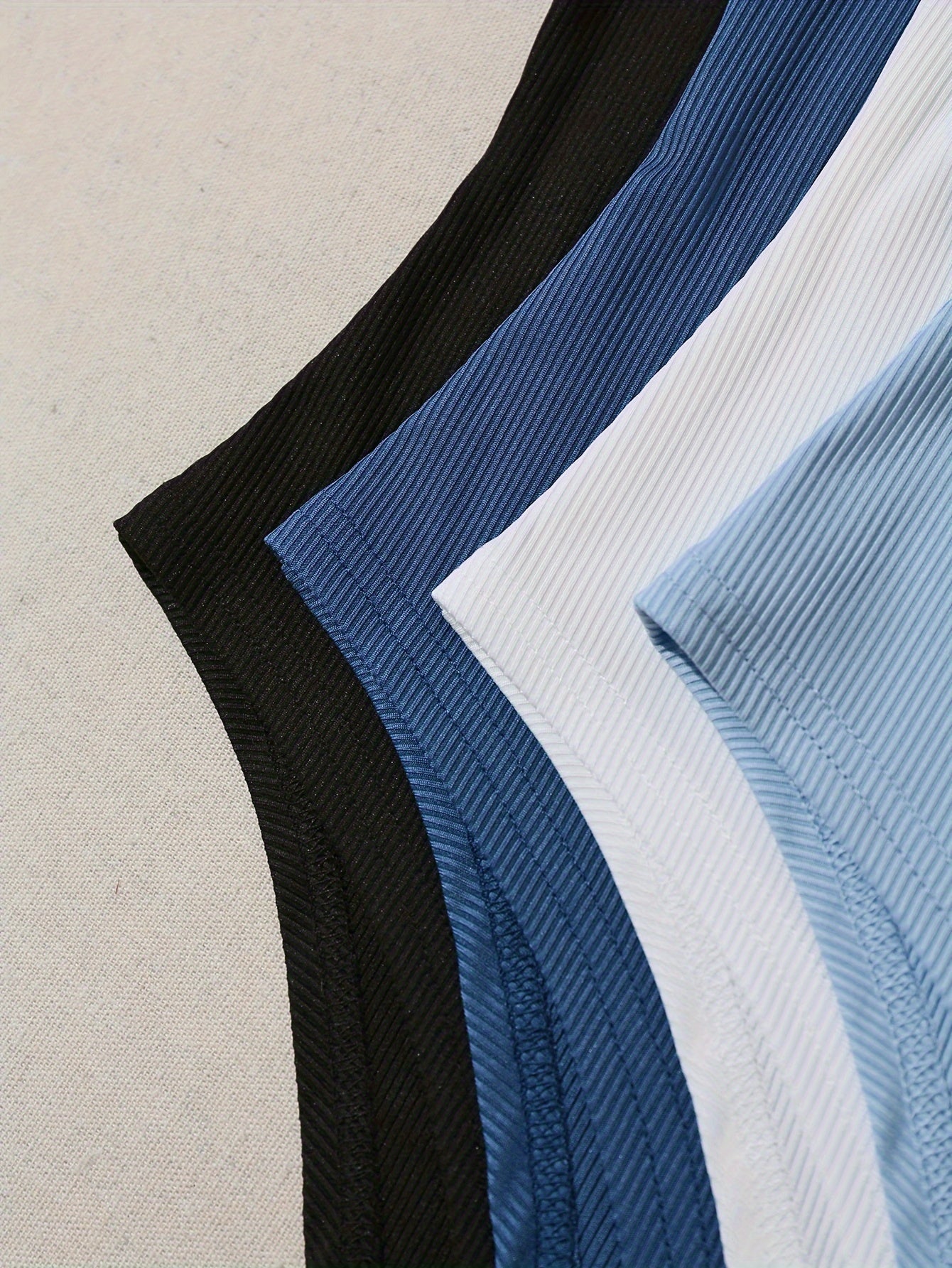 Ayollar uchun tasmasiz, oldida bog'ichli, yumshoq va qulay to'qilgan polyester mato, bir rangda, mos keladigan, bahor va yoz uchun.