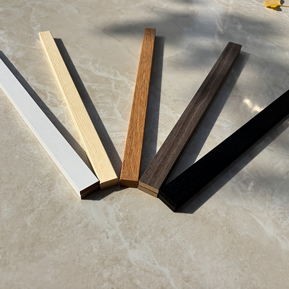 Zamonaviy magnitli yog'och ramkalar, turli o'lchamlarda, kuchli magnitlar bilan, har xil yuzalarda xavfsiz osish uchun mo'ljallangan, har qanday xonada fotosuratlar va kanvas san'at uchun ideal.