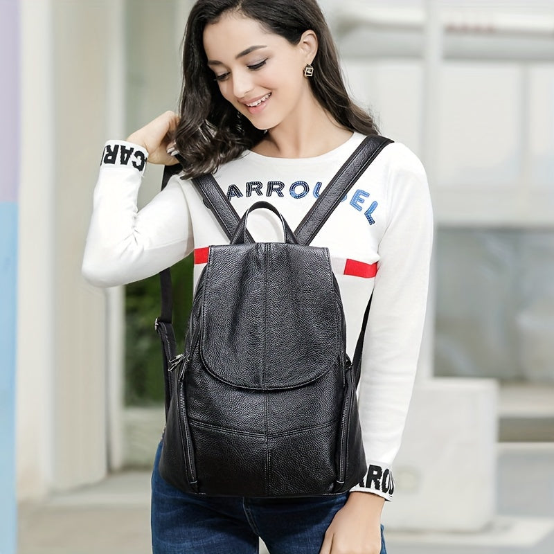 Ayollar uchun qora haqiqiy charm ruksak, sozlanadigan kamar, tortishish yopilishi va polyester astar bilan.