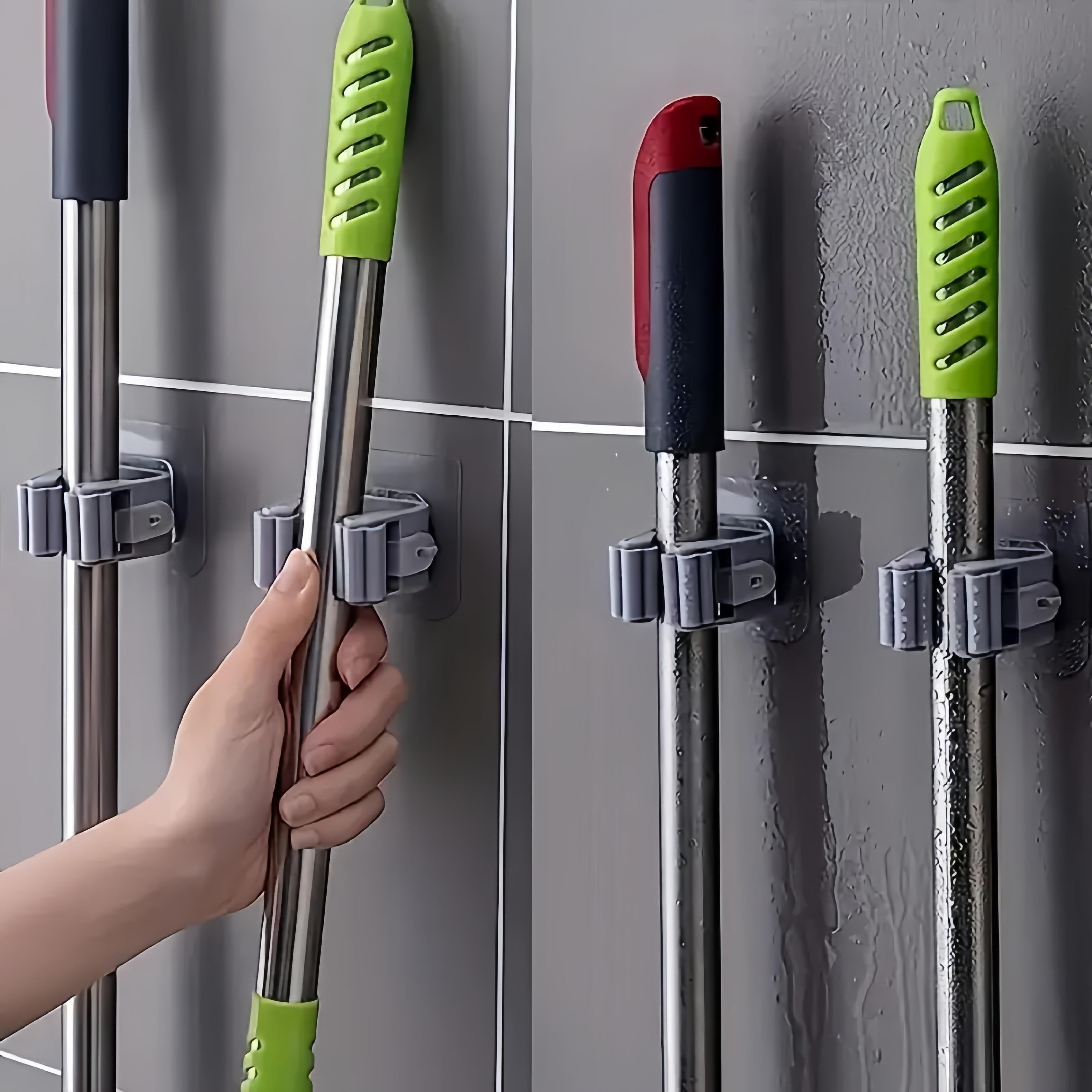 Organizador de pared para sujetar trapeadores y mopas de plástico gris para baño y lavandería