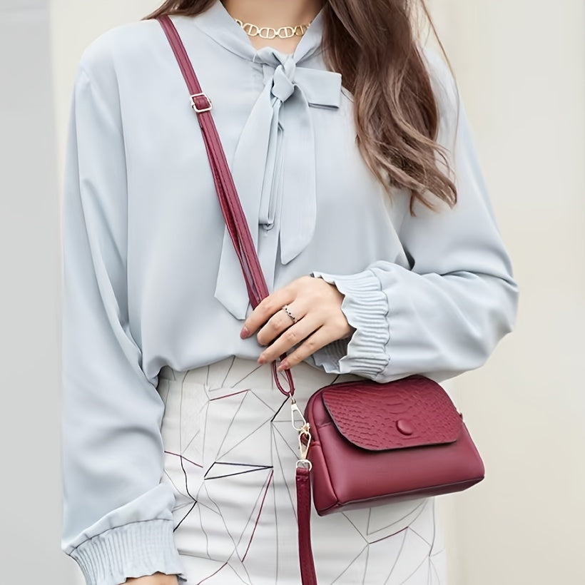 Ayollar uchun uslubiy mini crossbody sumka, olib tashlanadigan kamar va fermuar yopilishi bilan. Ishga borish va xarid qilish uchun mos.