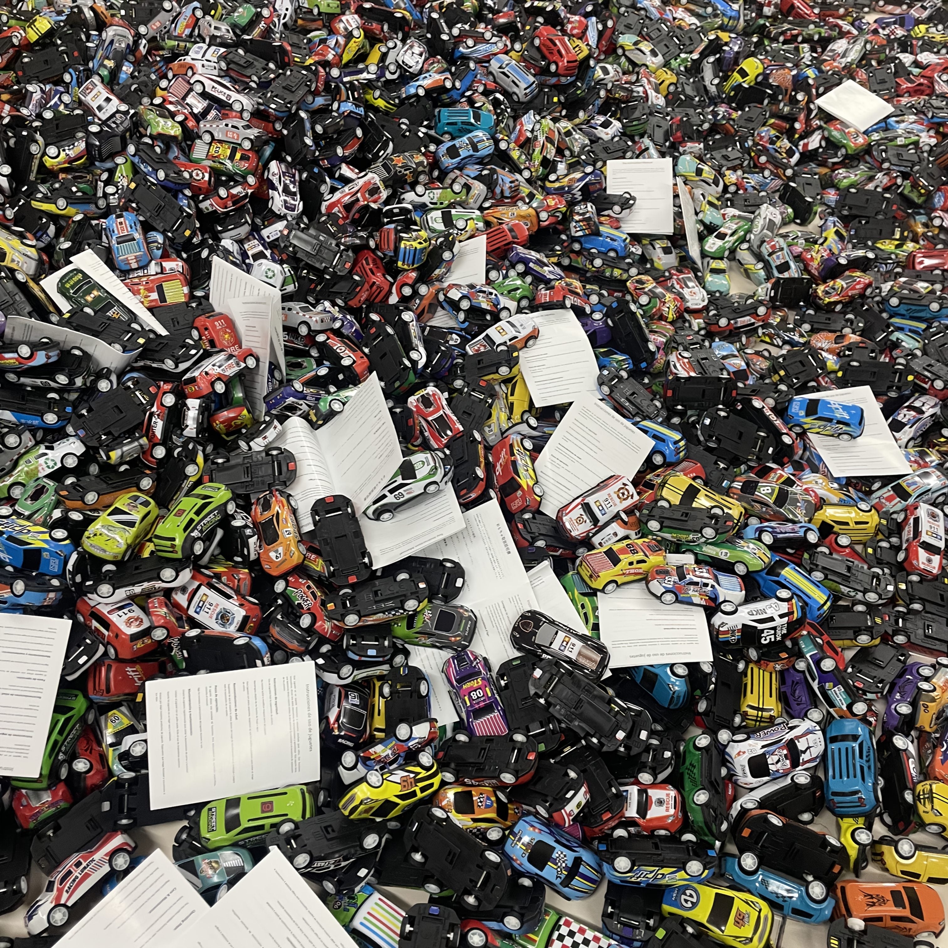 Set of 50 Friction-Powered Die-Cast Mini Rally Cars in Storage Box for Kids and Home Decor