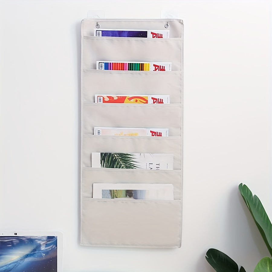 Organizador de almacenamiento en lienzo de pared con múltiples bolsillos para revistas y suministros de oficina