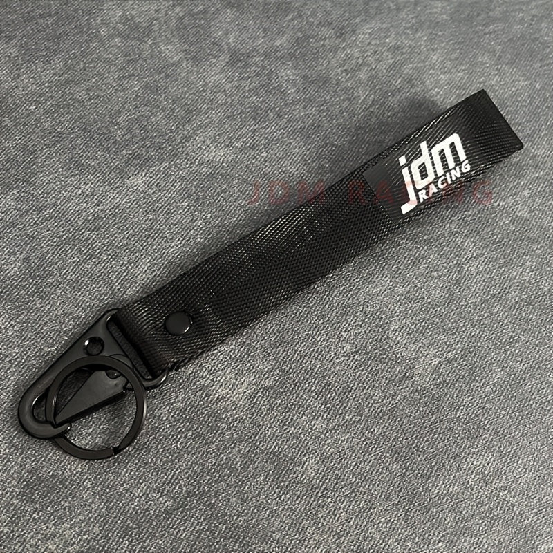 Issiq avtomobil kaliti zanjiri naylon tarmoq bilan ko‘k lentalik emblema kaliti bilan po‘lat klip bilan