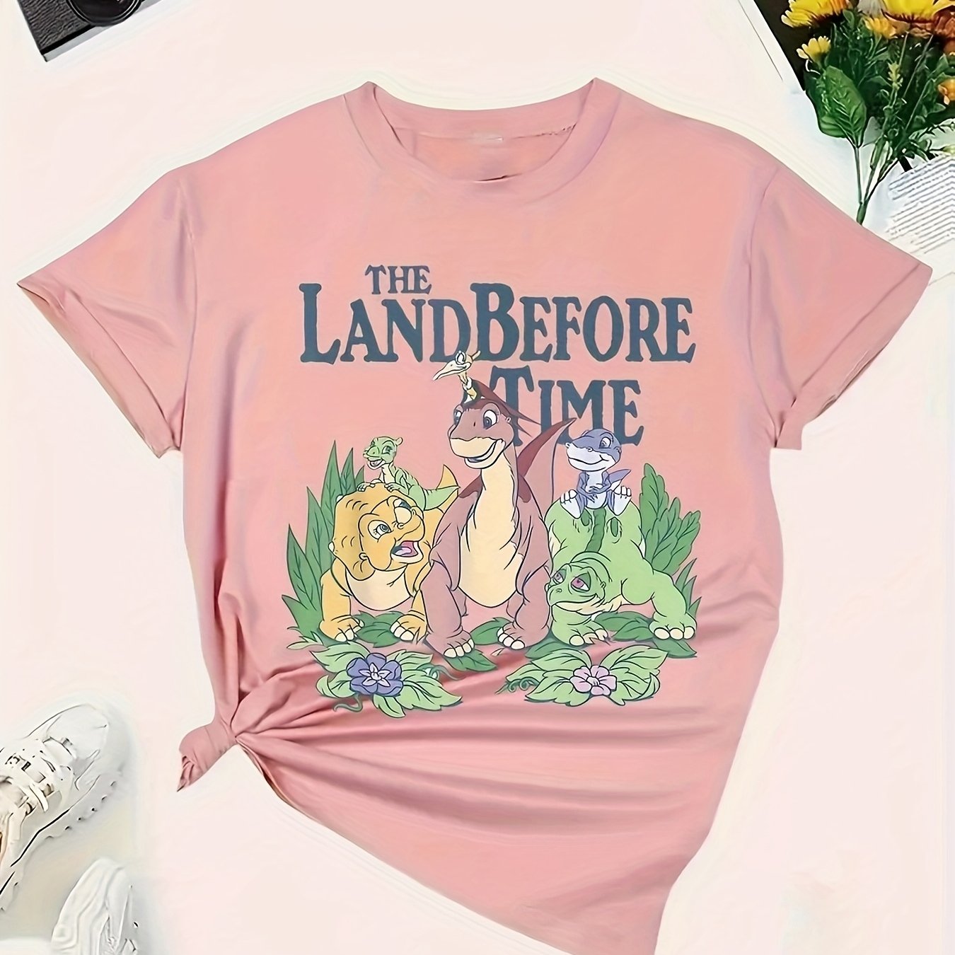 Plus Size Women's Pink Dinosaur Graphic T-Shirt with Floral Print
