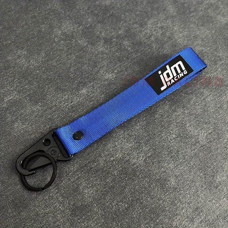 Issiq avtomobil kaliti zanjiri naylon tarmoq bilan ko‘k lentalik emblema kaliti bilan po‘lat klip bilan